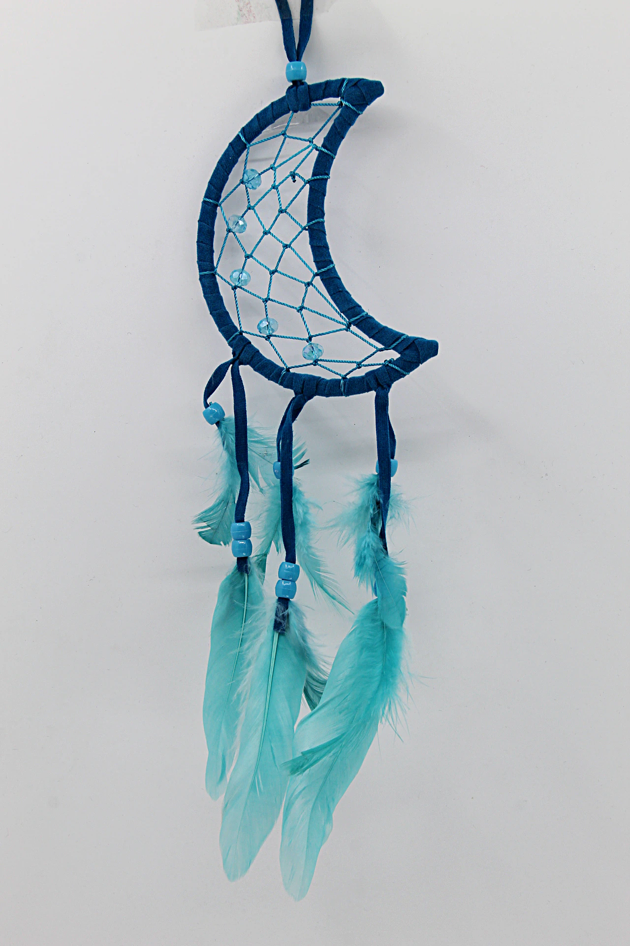 O Caça-Sonhos Meia Lua simboliza proteção