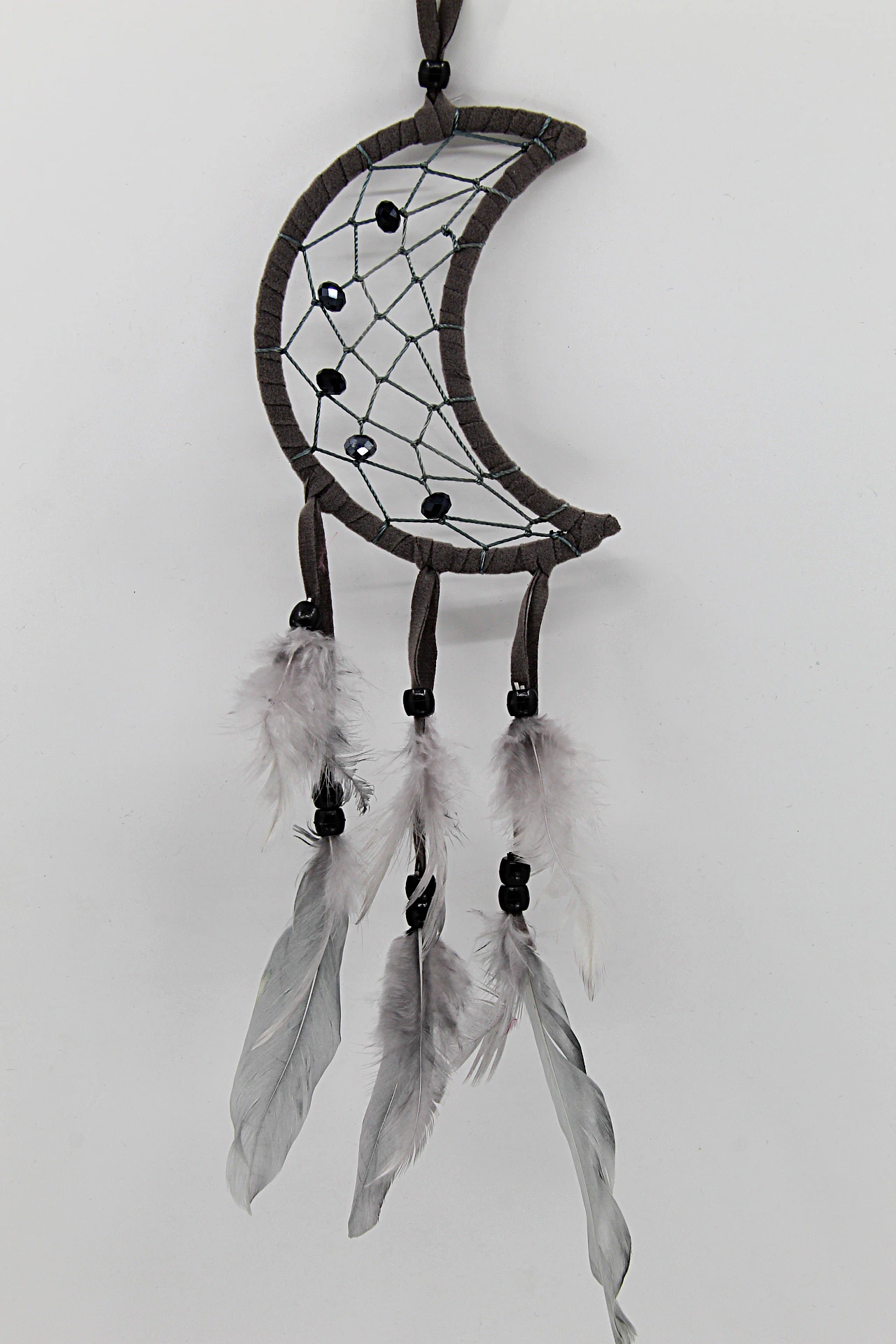 O Caça-Sonhos Meia Lua simboliza proteção