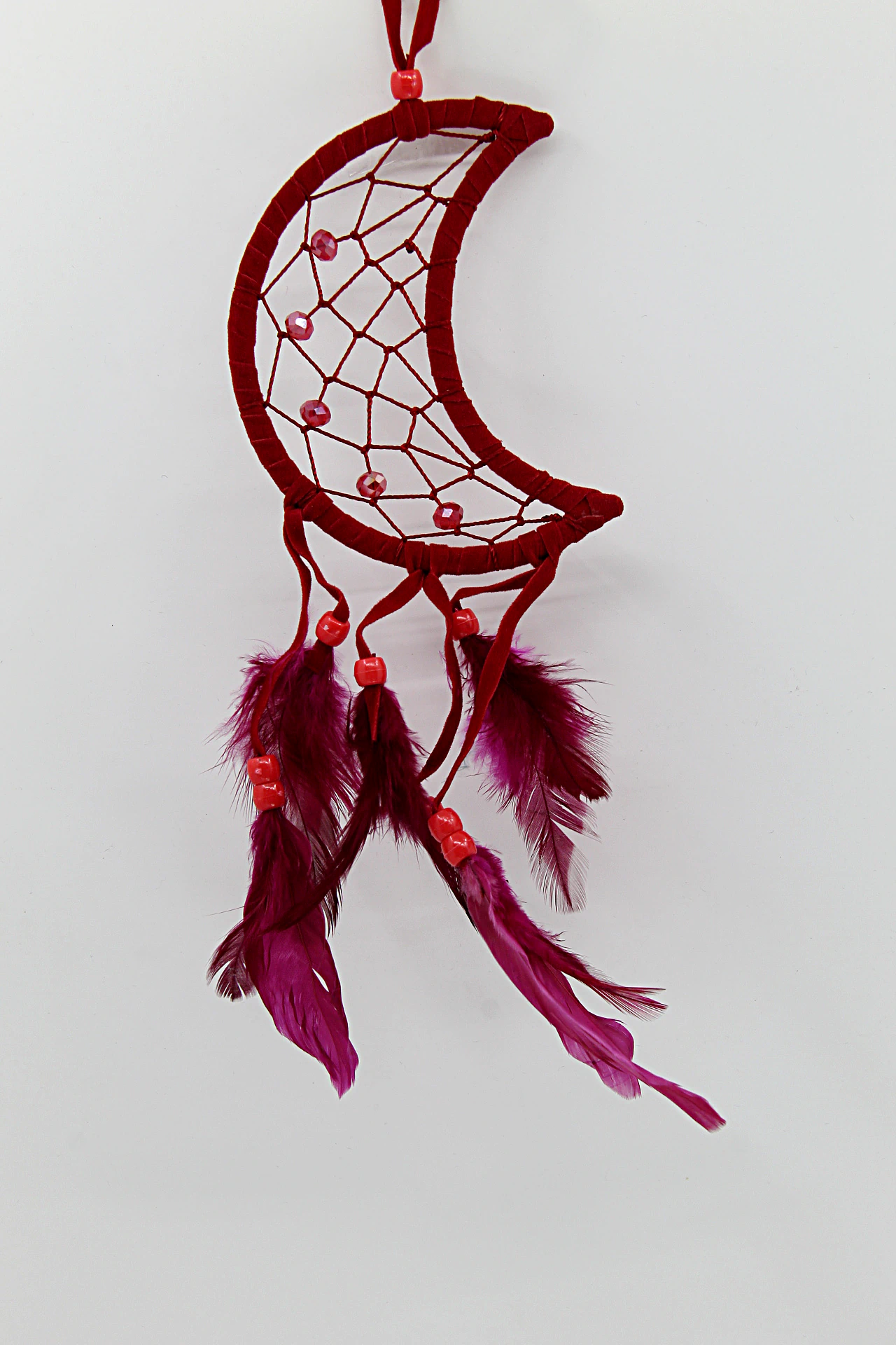 O Caça-Sonhos Meia Lua simboliza proteção