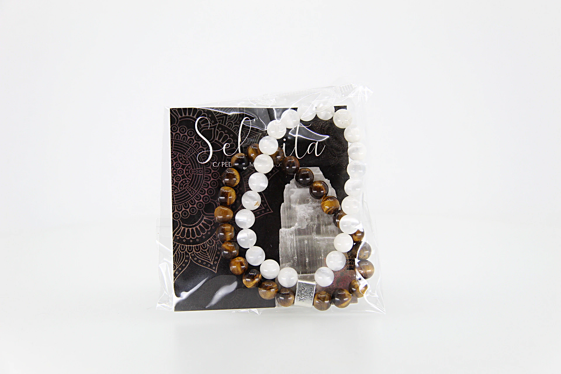 A combinação destas pedras na pulseira promove clareza mental e foco (selenite)